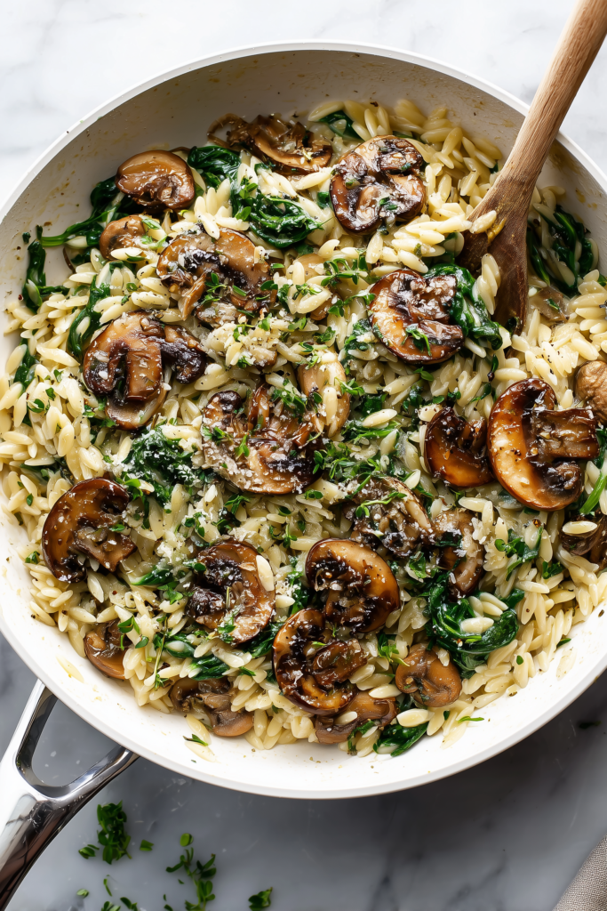 Garlic Butter Orzo with Mushrooms and Spinach 1 Ayala A creamy savory orzo pasta dish with golden mushrooms and d0ac4f41 a11d 4a2a 88ee d6e5020c9313